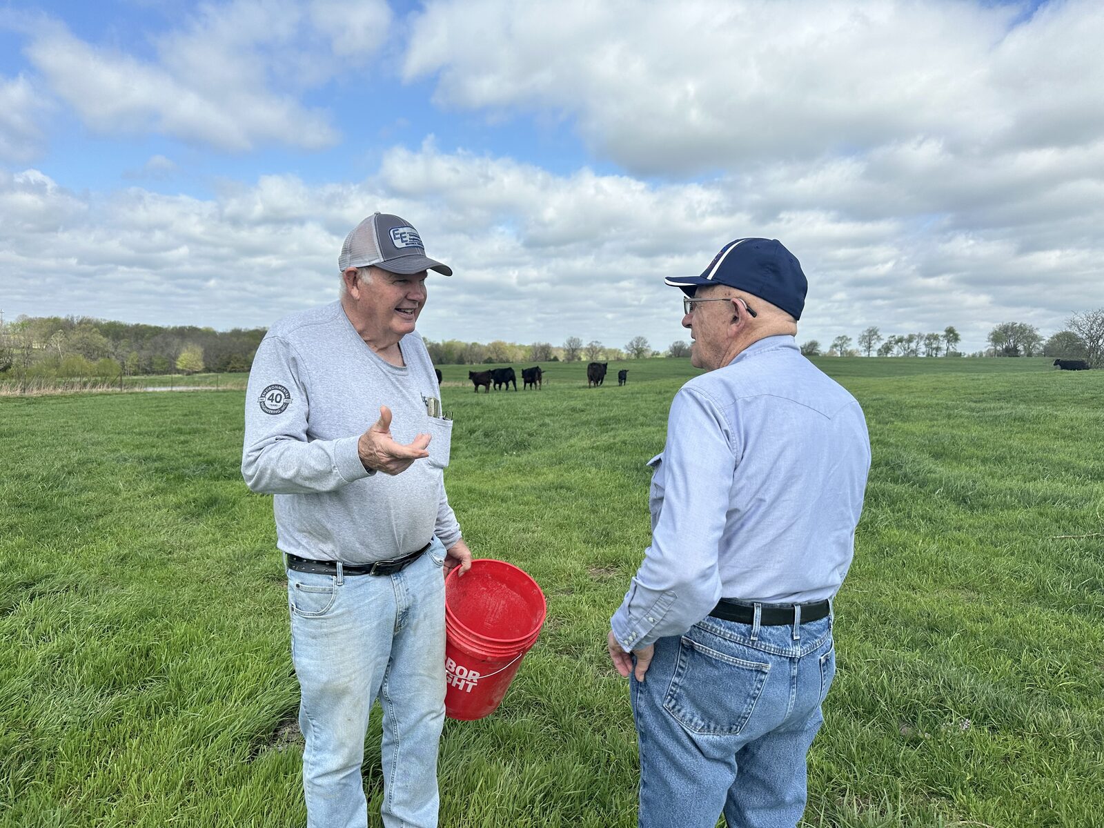 Roger Korenberg listening to a District 58 farmer in a Moniteau County pasture
